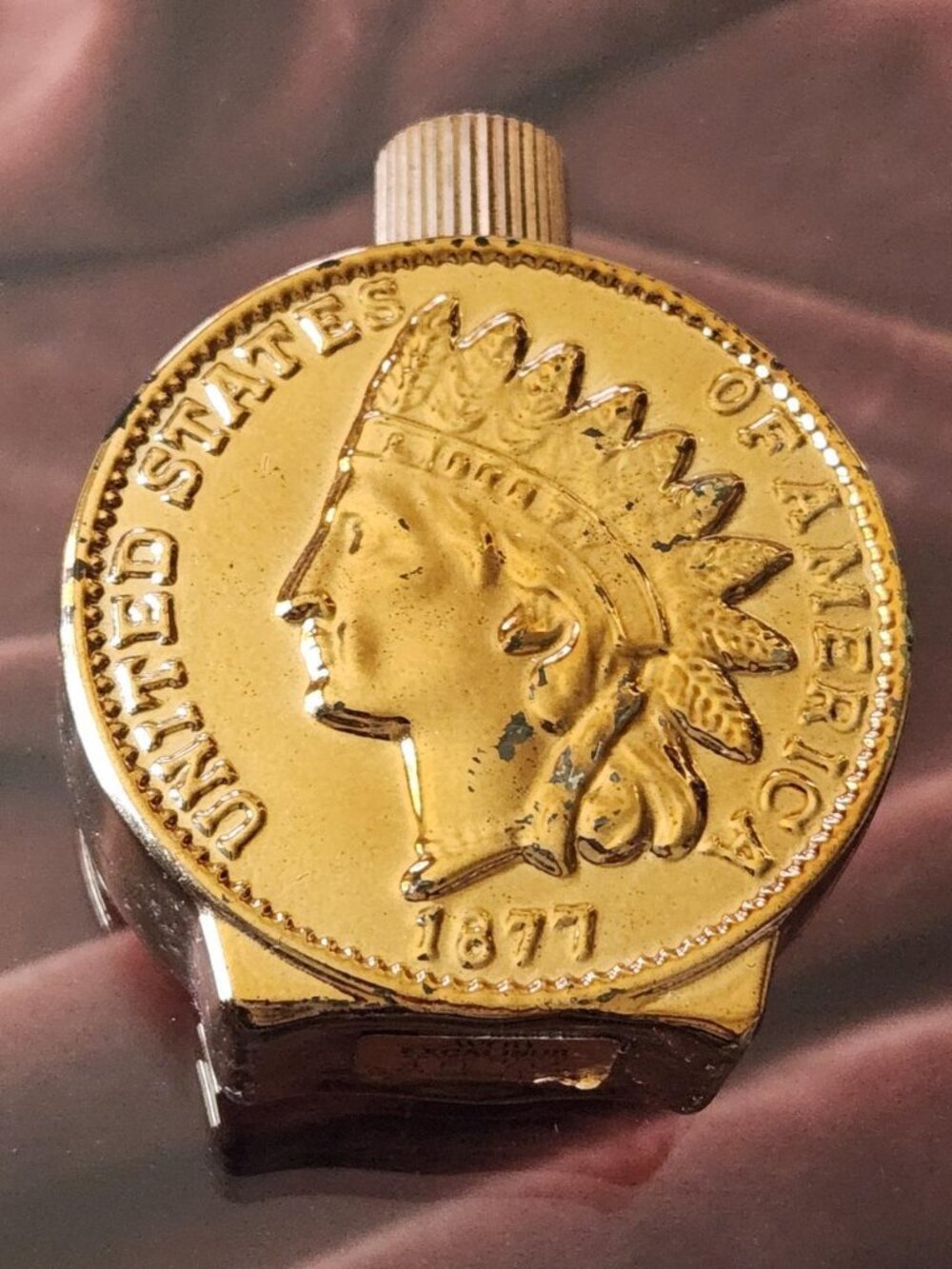 Vintage AVON "Excalibur" 1877 Indian Head Penny after shave bottle.